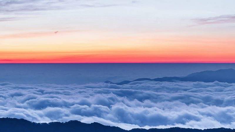 高山上看日出云海翻滚延时摄影-UI素材库